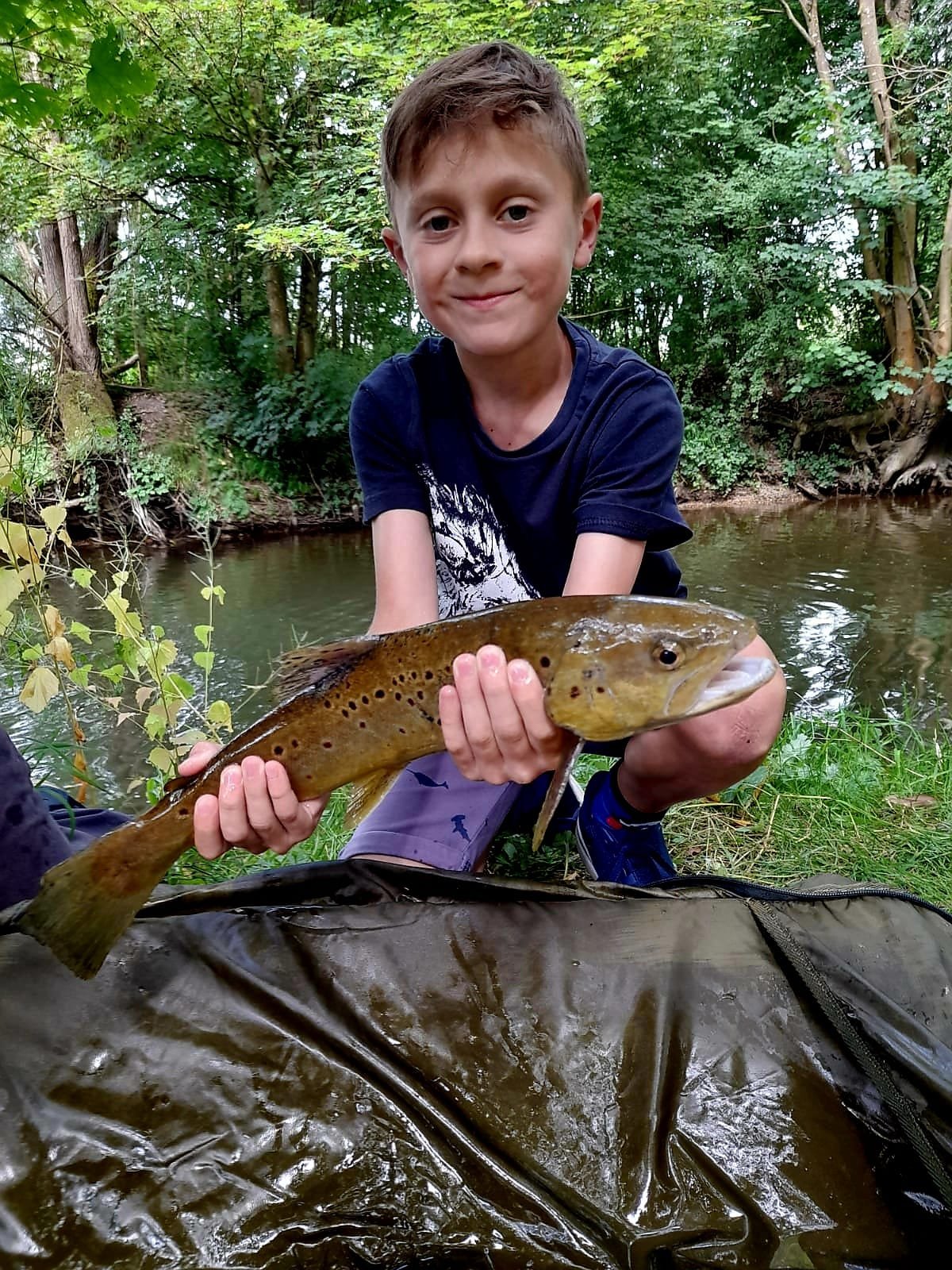 >Harry's first Brown Trout on or Langham River stretch